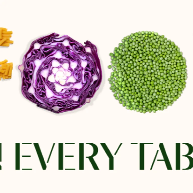 Image of the word Food spelled out using pasta, red cabbage, peas and grapefruit