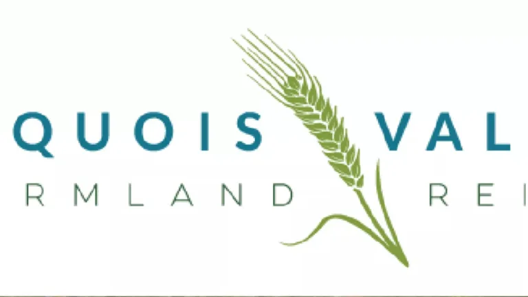 Iroquois Valley Farmland logo with a stalk of wheat