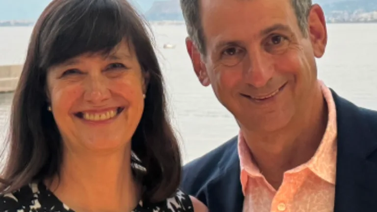 Professional Advisor Mitch Cohen and woman headshot