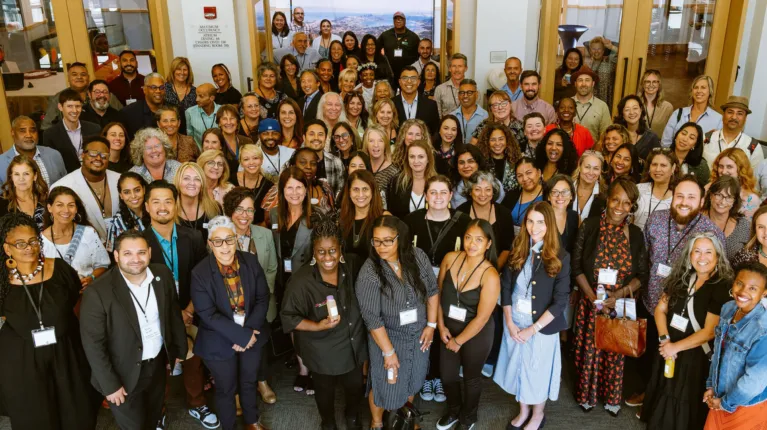 Large group of people smiling