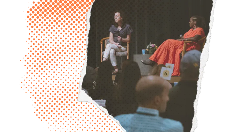 Two people on stage during a discussion in front of an audience, with a torn paper effect on the left.