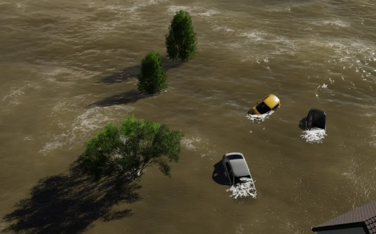Image of a flood carrying cars down a river in Texas