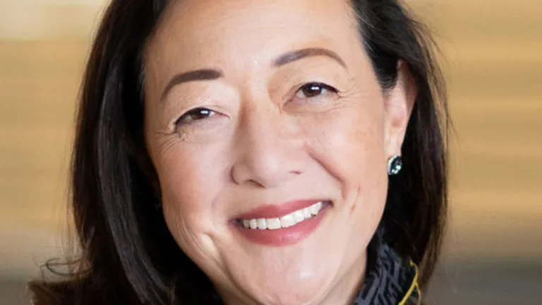 Headshot of Rhea Suh