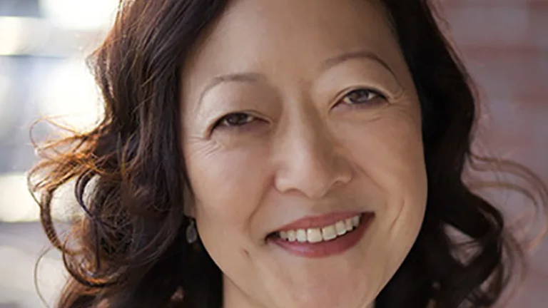 Headshot of Rhea Suh