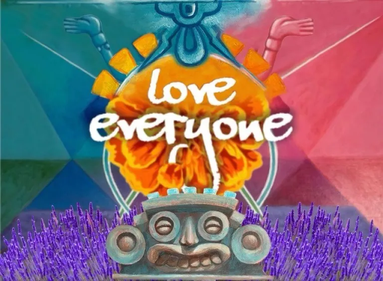 Image of a painting with Love Everyone text overlapping an image of an orange flower on top of a monkey face stone figurine