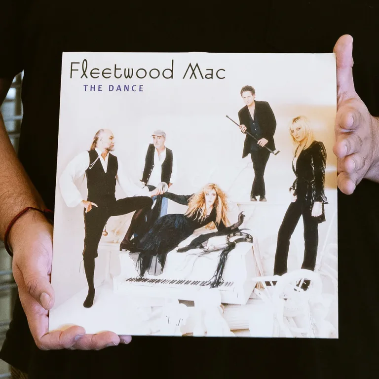 Aaron Davis holding Fleetwood Mac vinyl