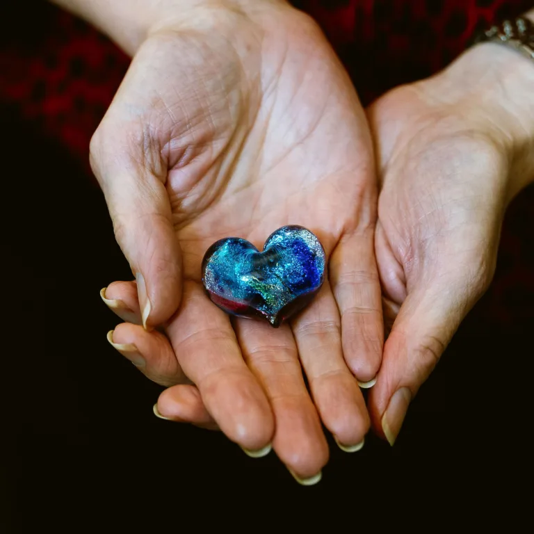 Bonnie Grossman holding heart