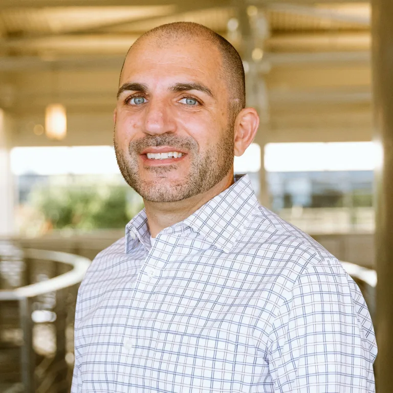 Headshot of Eric Saddik