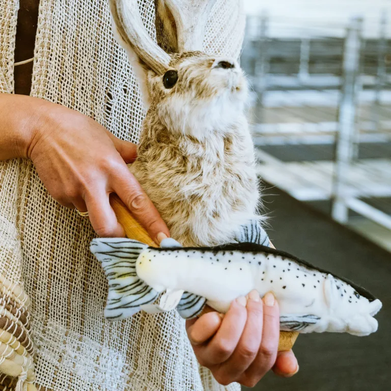 Rhea Suh holding rabbit and fish